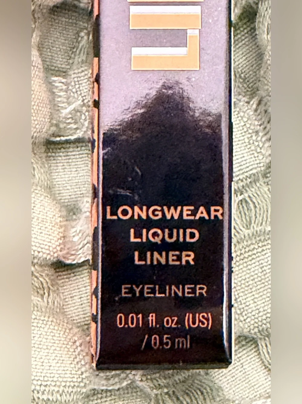Revolution Liner Pow Longwear Liquid Liner - Black & Gold Accents